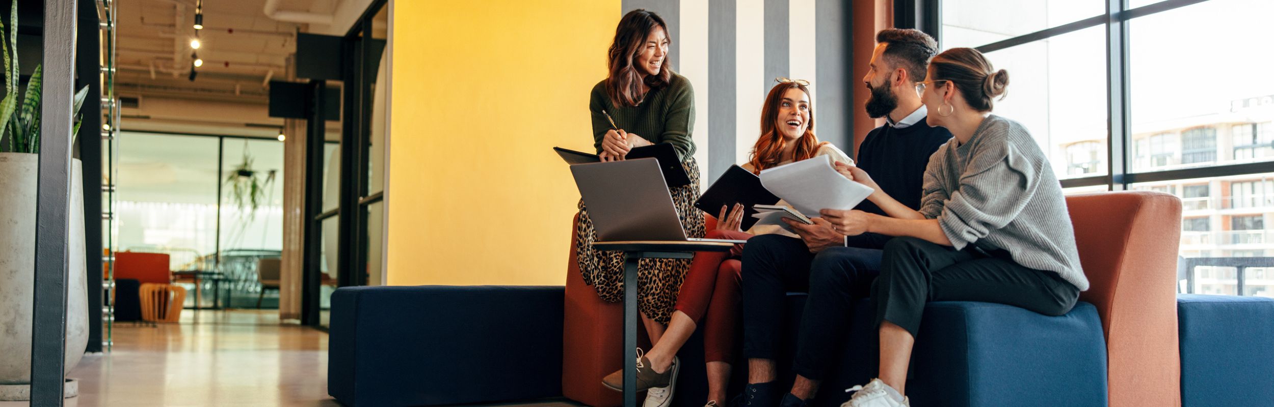 group of students sitting together working on class assignments