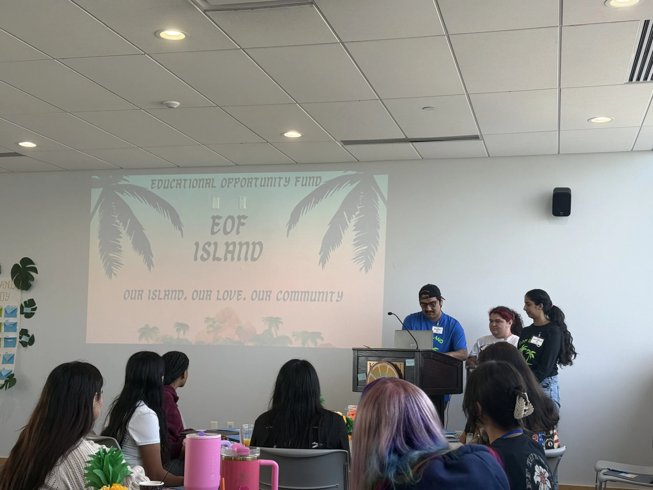 EOF student leaders presenting in front of group of students