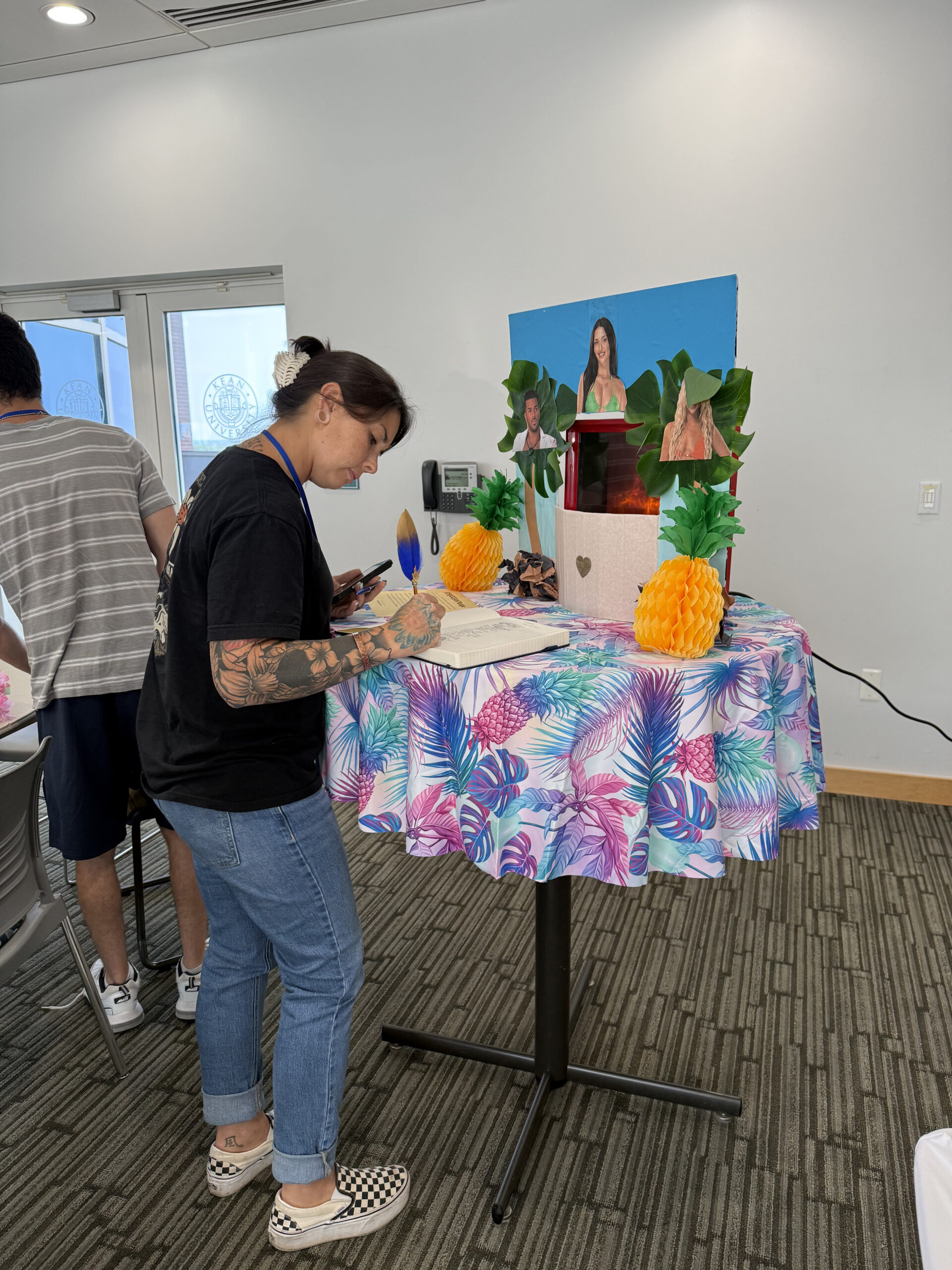 New EOF student signing the EOF pledge book